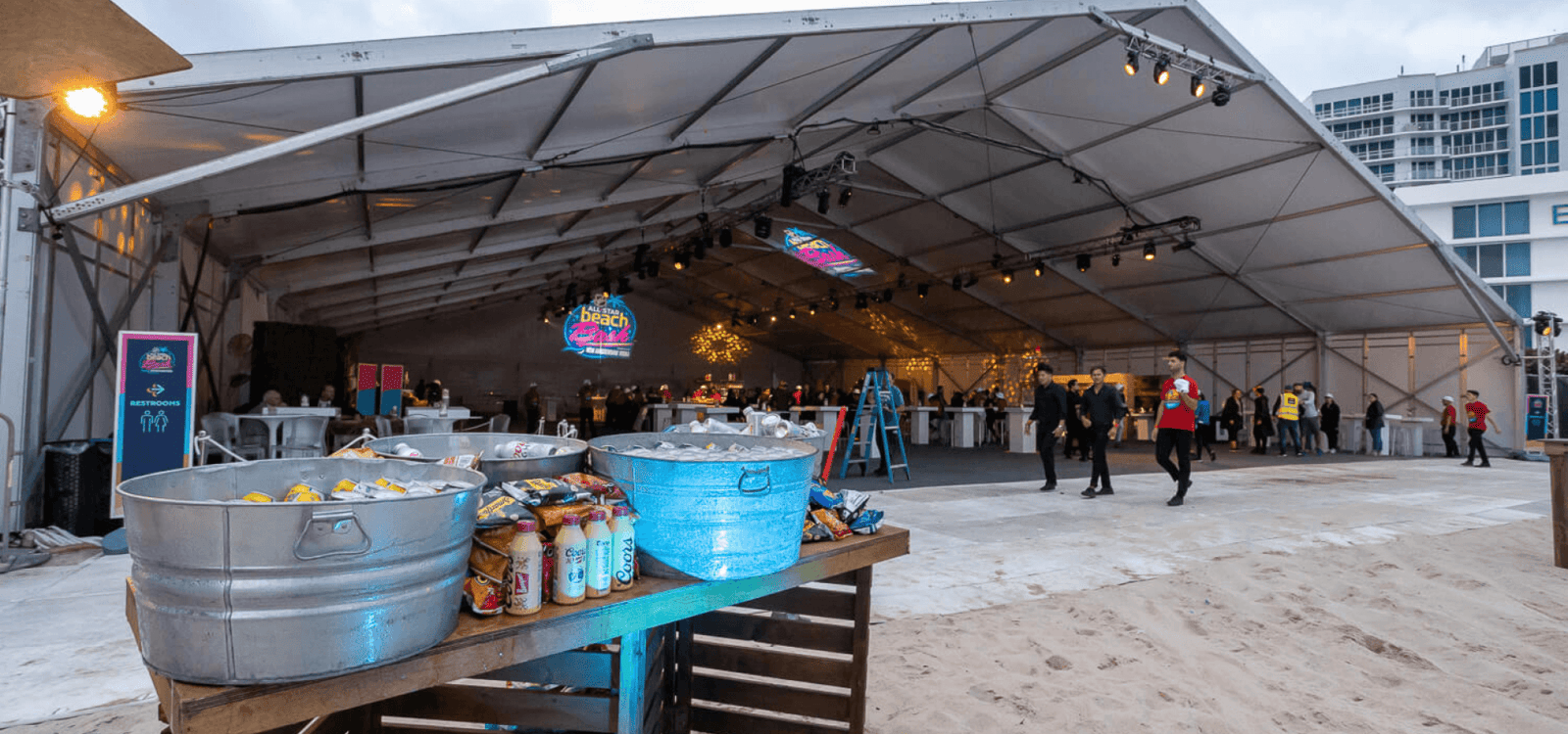 Eventure - NHL All Star 2023 tent with food stands and open bar on beach